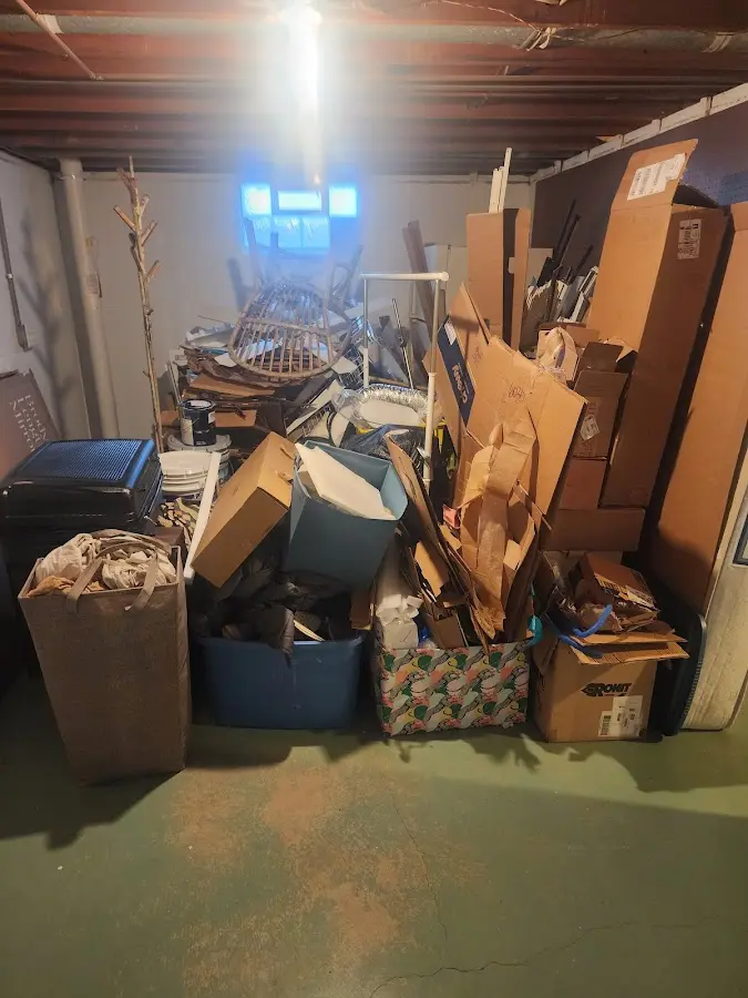 Roll-off dumpster container at job site for 20 Yard Dumpster Rental in Warren